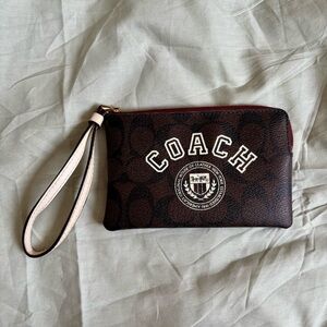 Vintage COACH Brown Signature Wristlet with Cream Strap